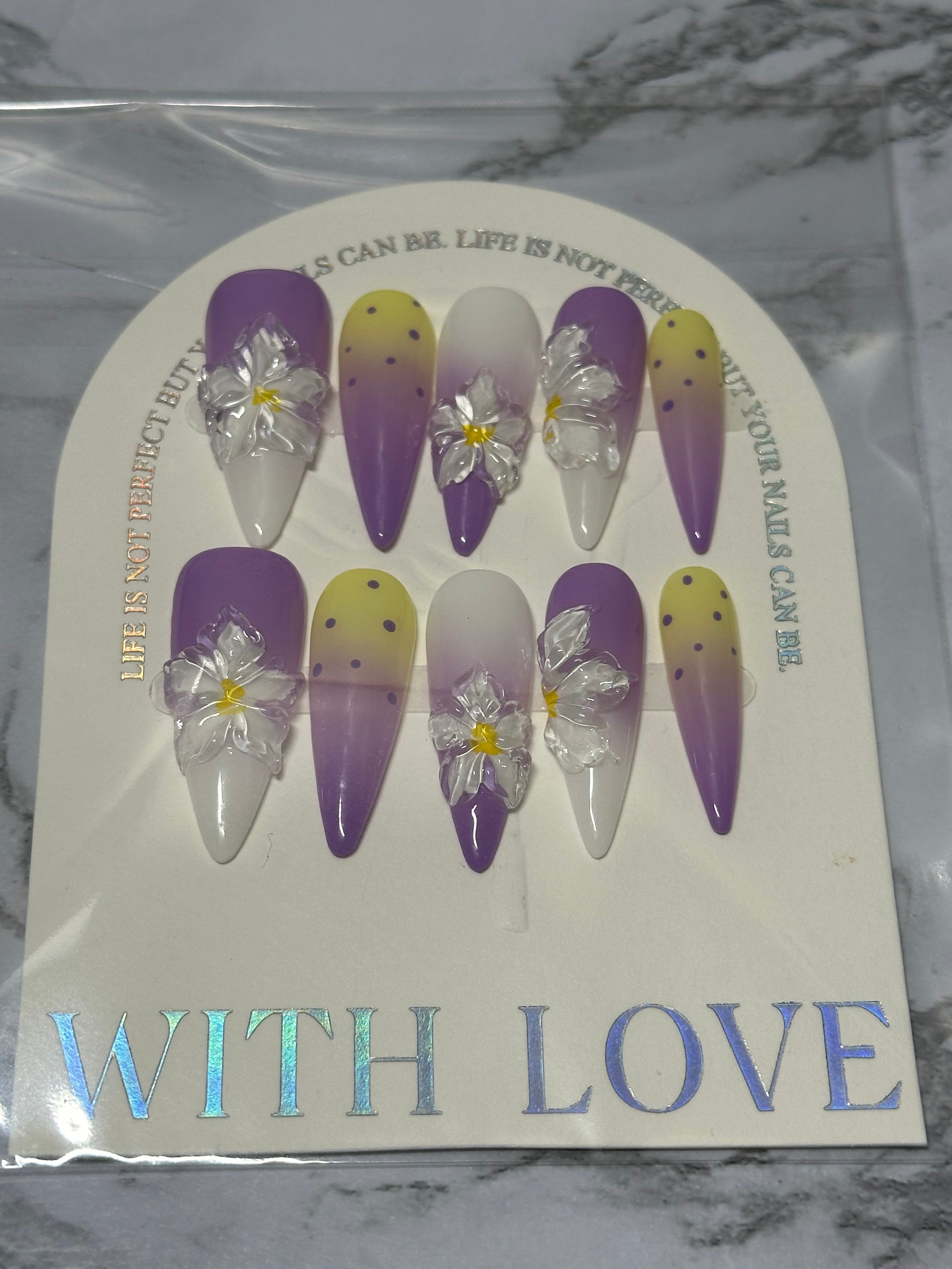 Purple and yellow nail